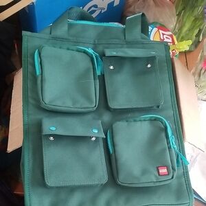Lego Dark Green Tote Bag with Teal Zippers and Pocket Accents